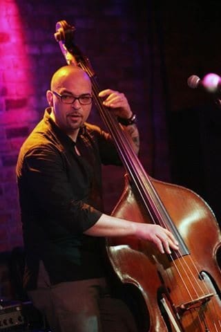Farmer is a proficient on both the electric and upright bass. He can frequently be seen with his upright when working with New York artist Alexis Hightower.